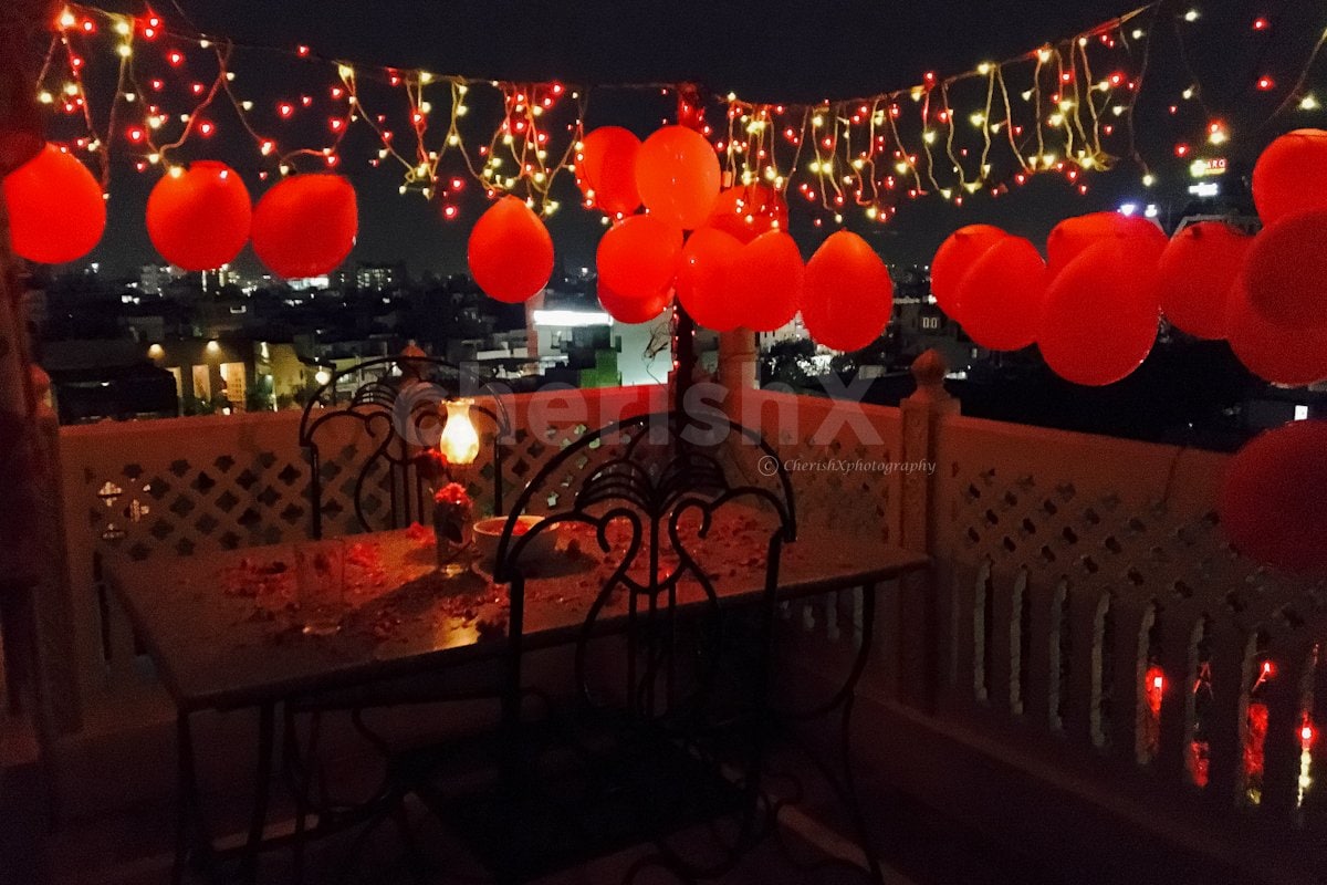 rooftop candlelight dinner proposal setups