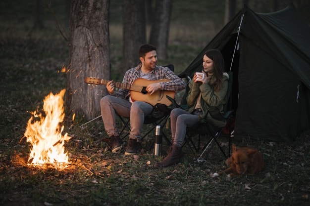 8 Fun Ideas to Spend Weekend Holidays With Your Partner- couple camping together