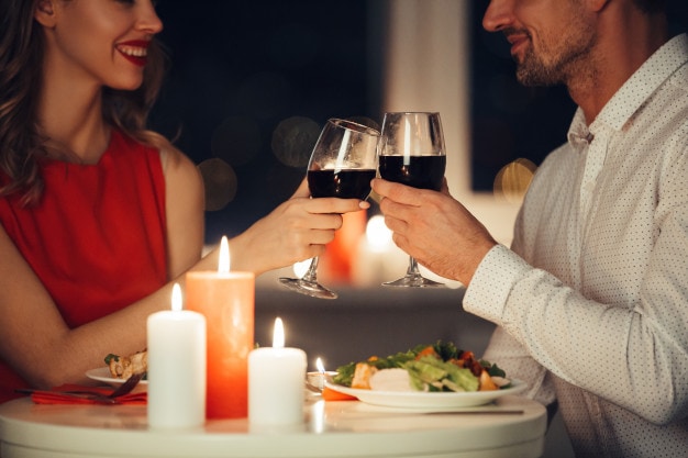 11 Wonderful Ways to Celebrate Valentine’s Day in 2021-couple-lovers-having-romantic-dinner-home_