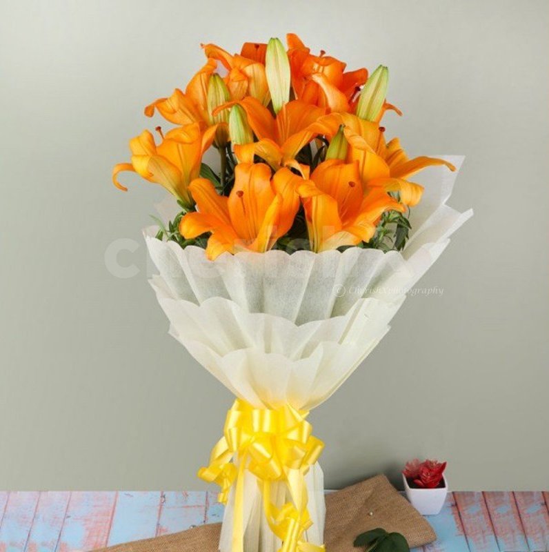 12 Best Flowers to Gift Your Beloved on Valentine's Day-orange lilies