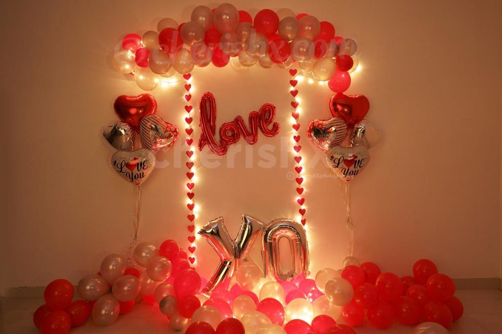 Romantic Red Love XO Valentine's day decoration featuring red and white balloons