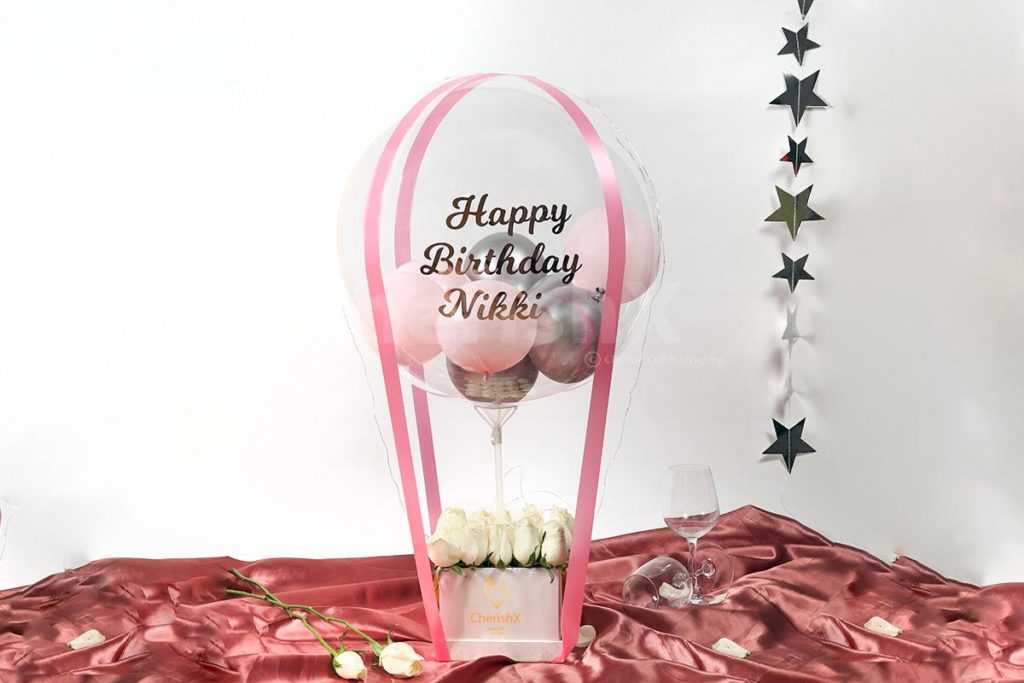 Pastel Pink Bucket featuring a tulip flowers for rose day gifts 