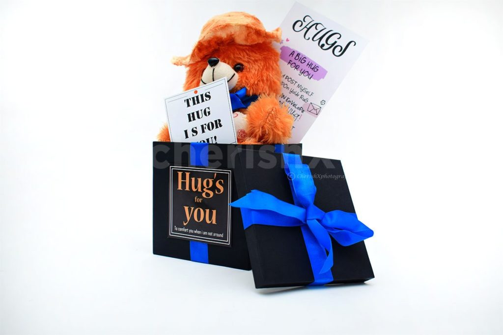 teddy bucket featuring a message for hug day 