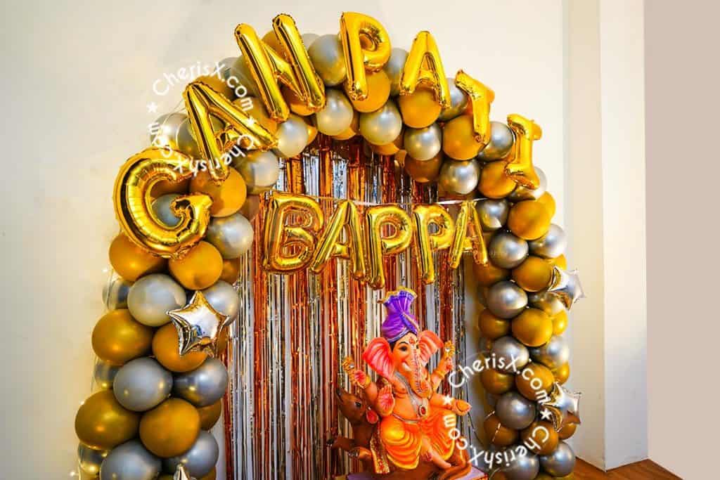 Ganesh Chaturthi Decorations with Golden Balloons & Silver Arch