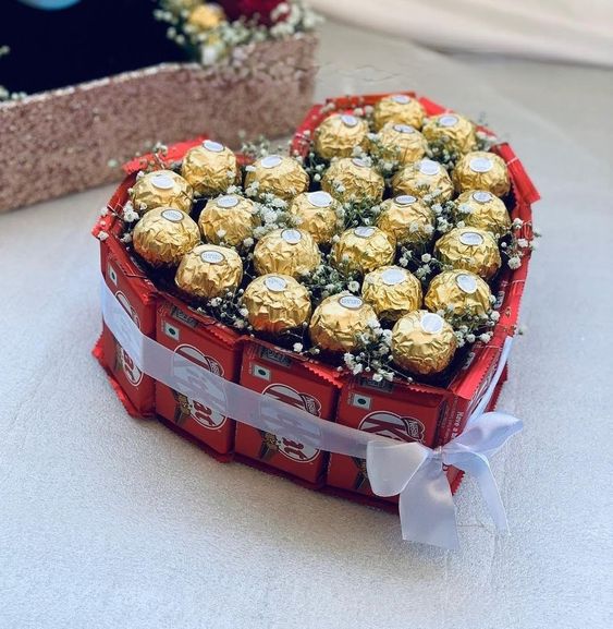 chocolate day gift idea featuring a heart shaped kit kat chocolates and ferrero rocher 