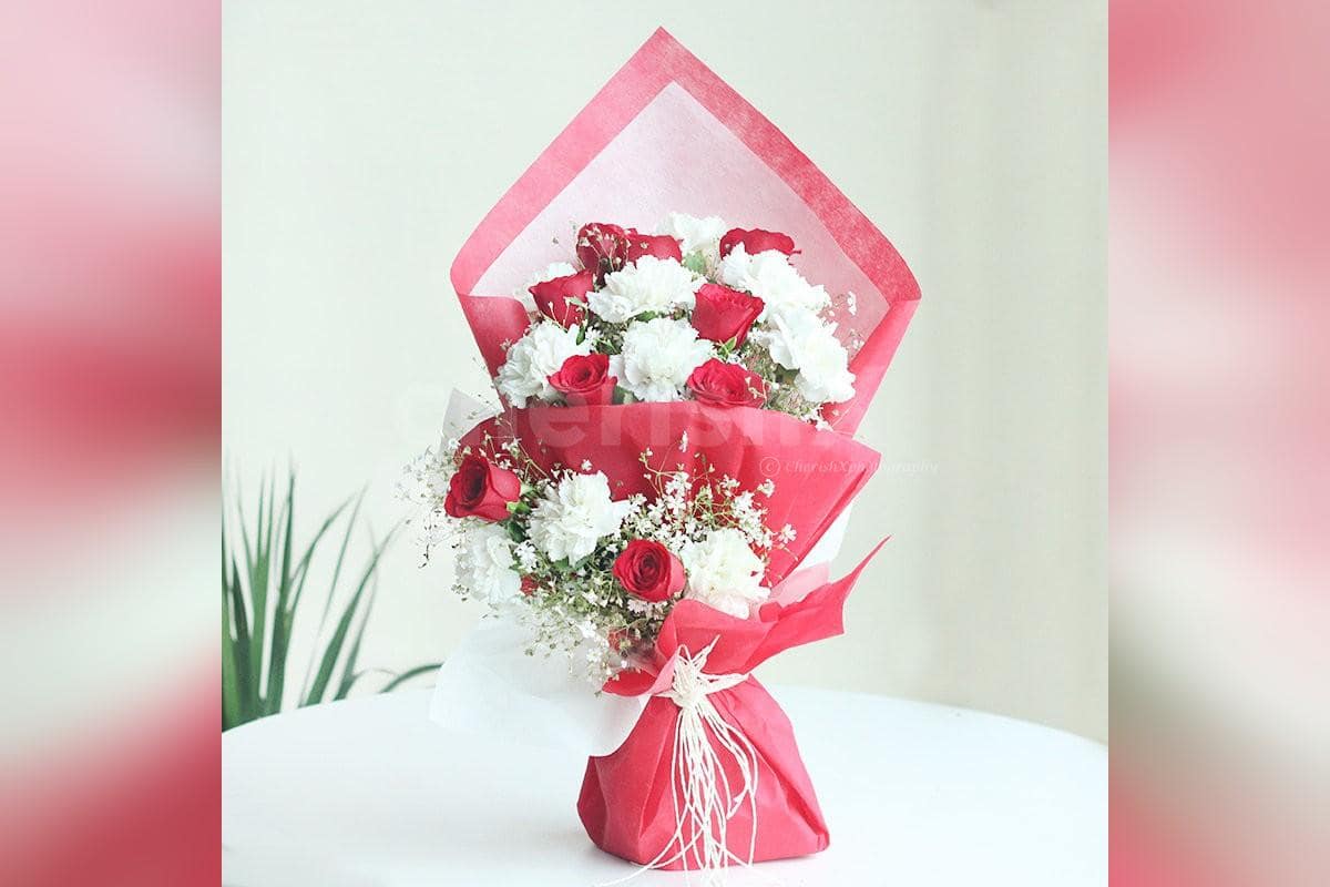 10 White Carnation & 10 Red Roses in Red & White Paper Bouquet