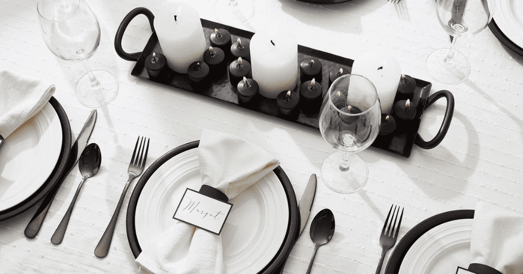 table setting for black and white party theme 