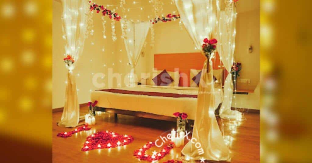 romantic bedroom decoration for first night with fairy lights and drapes.