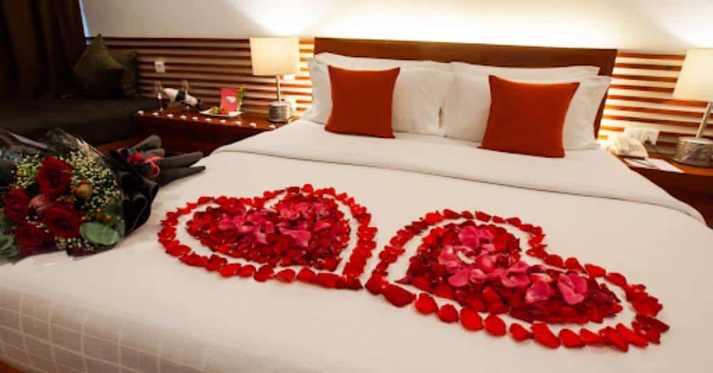 first night room decoration - roses on bed decoration 