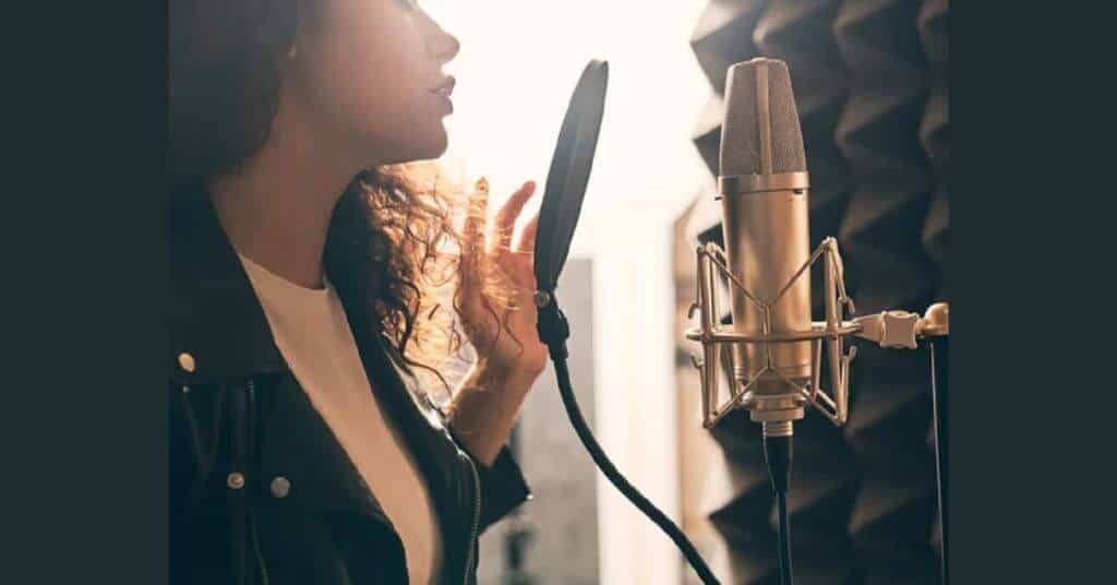 a wife recording a birthday special song for husband to surprise him. 