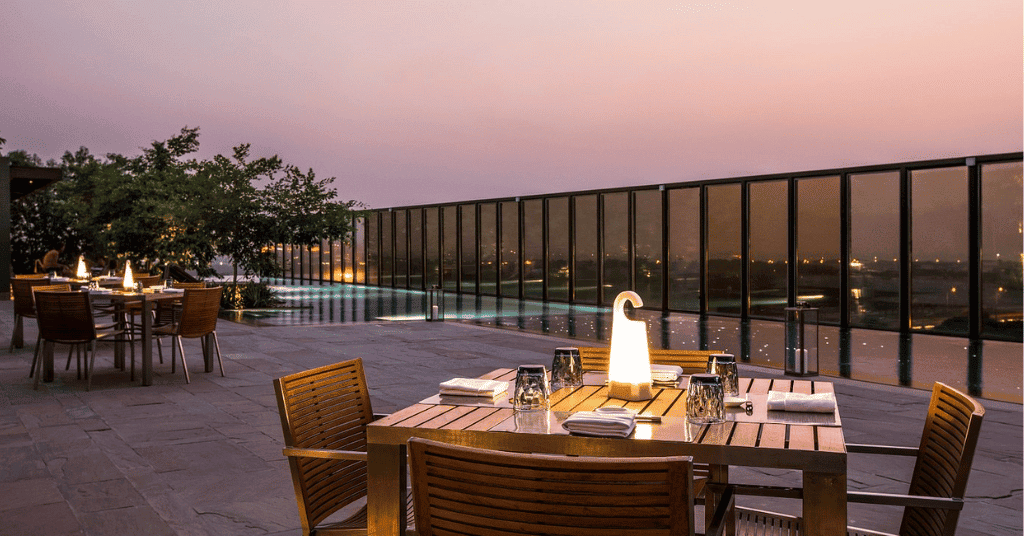A perfect poolside and romantic sitting area in The Roseate, Delhi NCR 