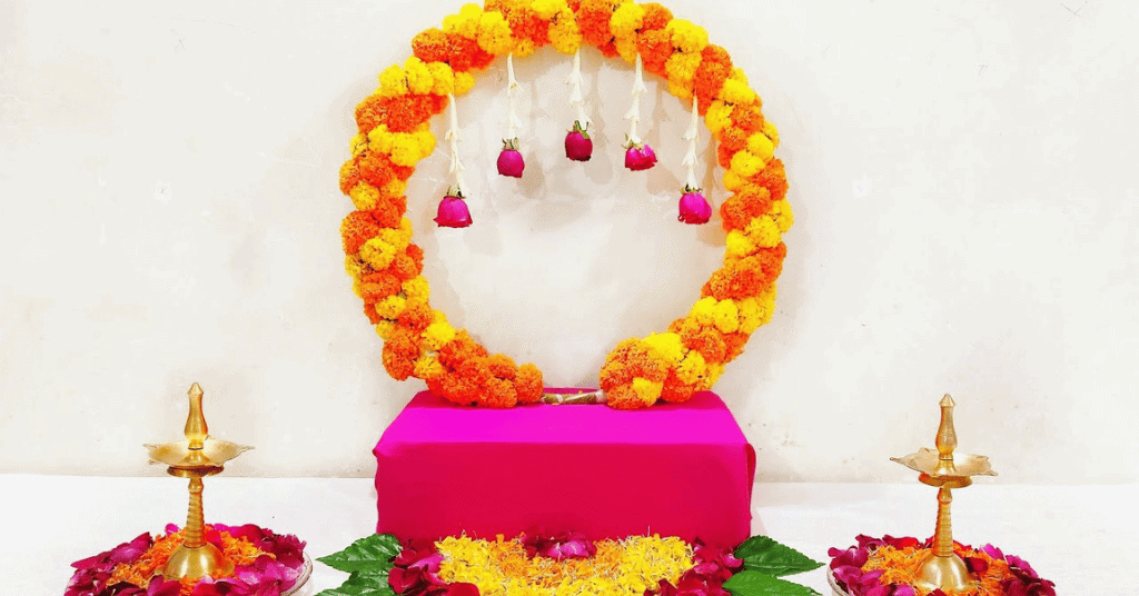 Navratri Mandap Decoration Idea With Mini Marigold Ring Backdrop 