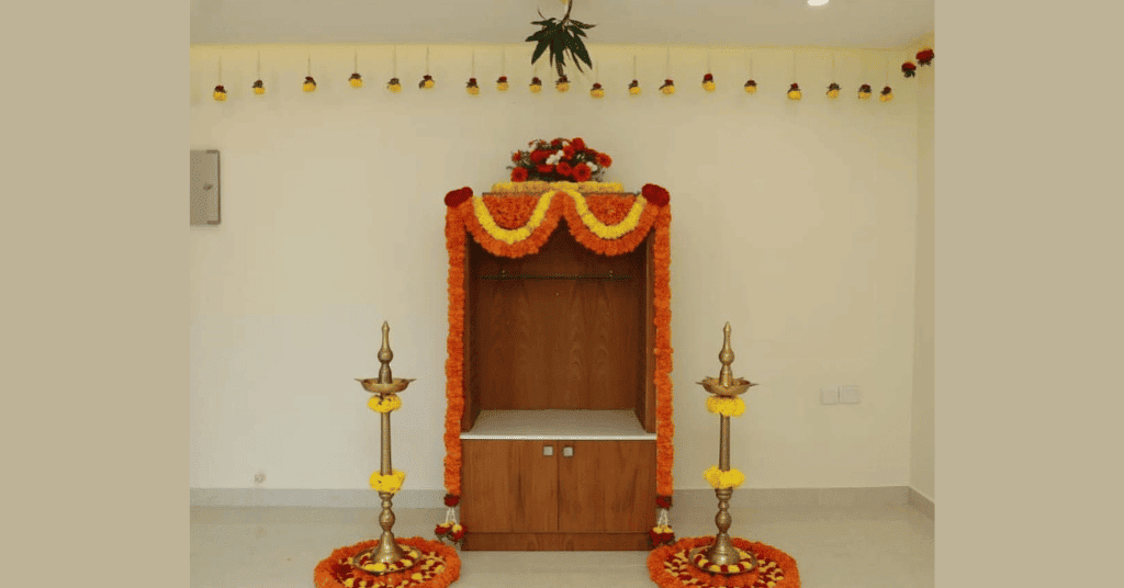 Wooden Mandir Navratri Decoration Idea With Yellow & Orange Marigolds