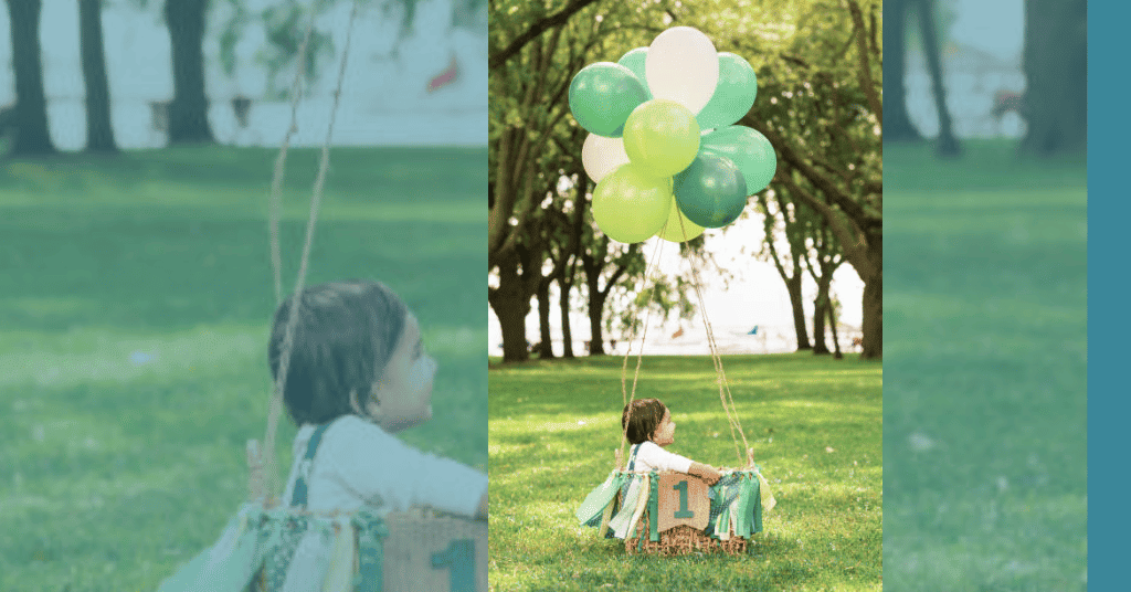 Unique 1st birthday outdoor photoshoot: Little girl in jute basket with '1' and helium balloons.