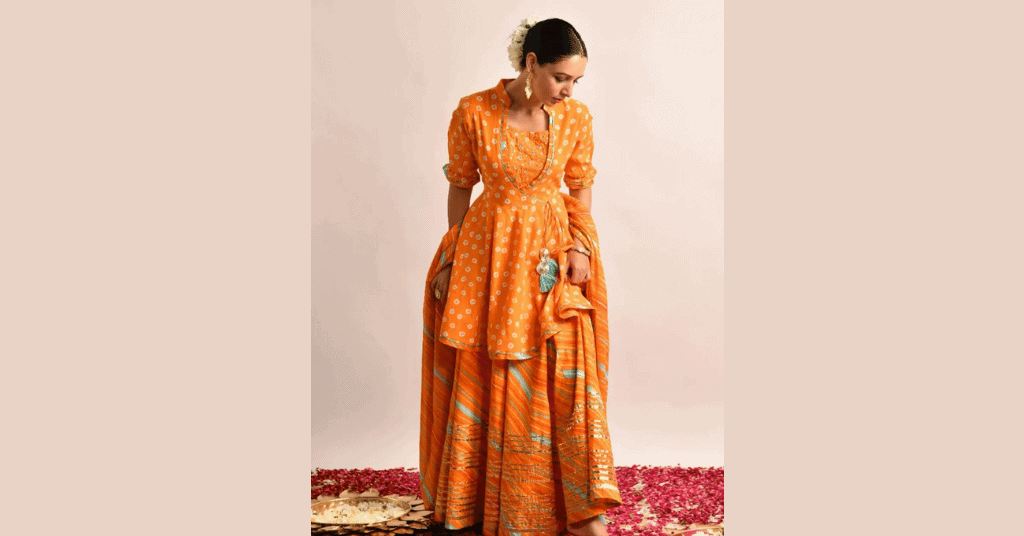 orange colored Printed Shararas as one of the best Diwali outfit ideas 