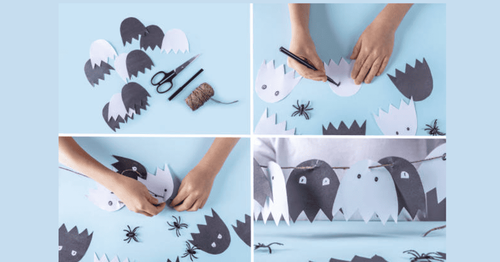 white and black ghost bunting for the halloween party decoration ideas
