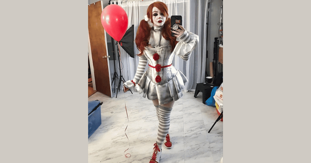 Pennywise the Clown Outfit with white face paint is one of the great halloween costumes for girls
