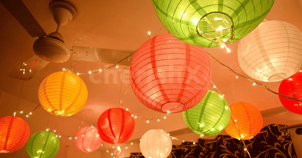 red, yellow, green, and white paper lantern decorations at home 