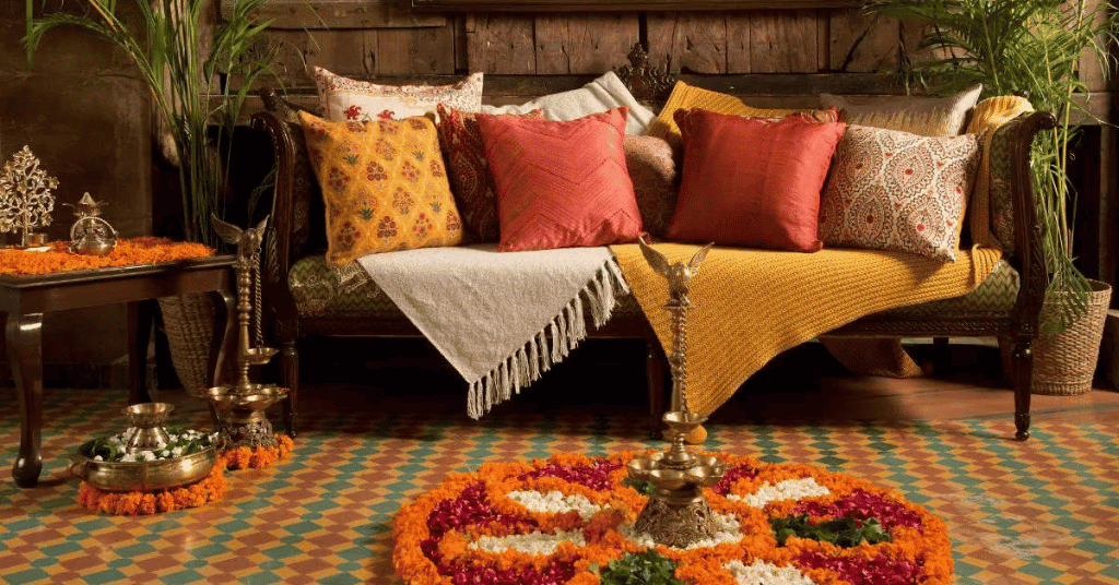 Diwali themed cushion covers and beautiful flower rangoli at home 
