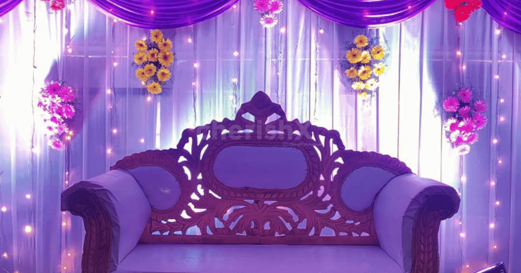 Blue-Themed Stage Decoration with flower bouquets 