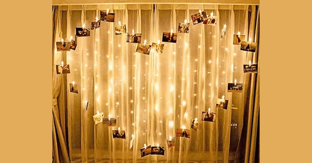birthday decor without balloons with photo memory strings as a backdrop 